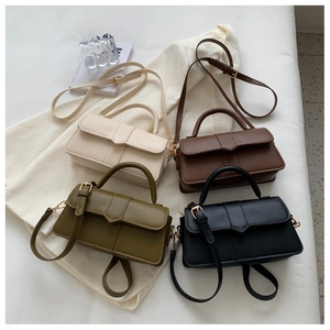 Selection of four vintage crossbody bags in cream, brown, green and black colors