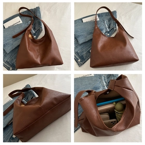 Detailed views of a dark brown retro hobo tote bag showing spacious interior capacity