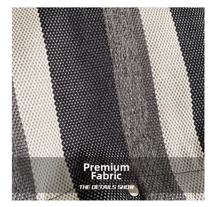 Detail showing high-density striped fabric texture and silver metal rivet of tote bag