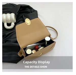 Macro view of the khaki crossbody bag interior showing spacious capacity for daily essentials