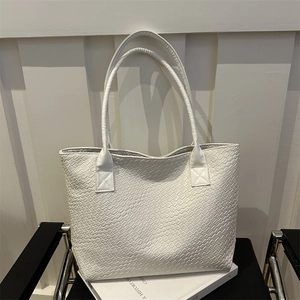 Minimalist white woven texture tote bag made of premium PU leather for women's daily commute