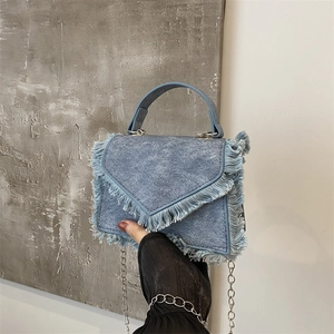 Retro light blue denim mini square handbag with fringe tassels and metal chain strap