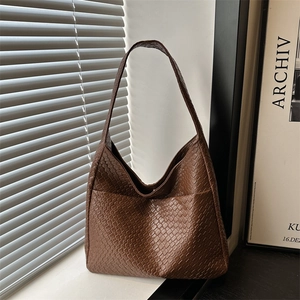 Deep brown woven leather hobo tote bag with a minimalist large capacity shoulder design