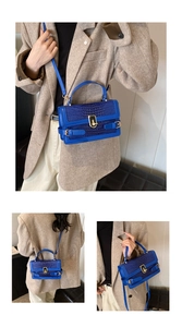 Detailed views of a blue crocodile-patterned crossbody bag with a golden turn-lock