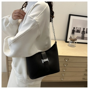 Minimalist black half-moon underarm bag with silver H buckle and stylish chain strap