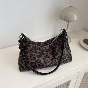 Grande borsa tote vintage leopardata con manici rotondi in pelle nera e nodi decorativi