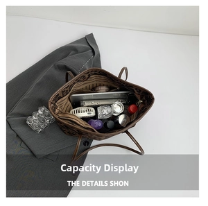 Interior view of leopard print tote bag showing large capacity for daily essentials