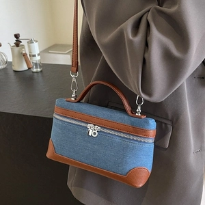Chic denim and brown leather patchwork crossbody square bag with silver zipper closure