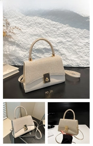Detail of elegant gold glitter and white leather square handbag with metal rotary lock