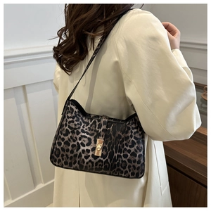 Leopard print underarm shoulder bag for women with golden square lock and slim handle