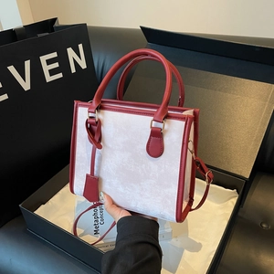 Chic red and white color-block tote bag with marble pattern in a premium gift box