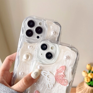 Close-up of iPhone case with cream glue texture, 3D butterflies and elegant pearls