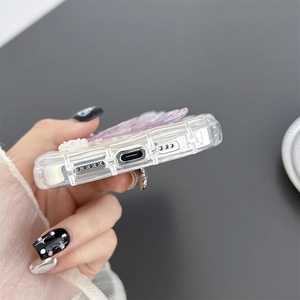 Detail showing precise cutouts for charging port and speakers on iPhone clear case