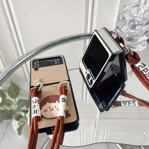 Champagne gold folding phone case with cute cartoon girl and brown crossbody braided strap