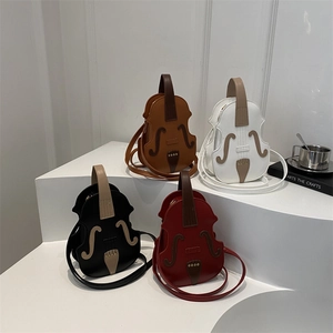 Creative violin shaped crossbody bag in brown white black and red with golden rivets