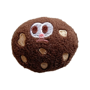 Plush chocolate cookie phone grip with cute embroidered face and retractable stand