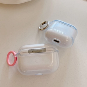Clear earphone case detail showing matte TPU texture with pink and silver carabiners