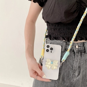 Braided crossbody phone strap with yellow bow and adjustable multi-color woven lanyard