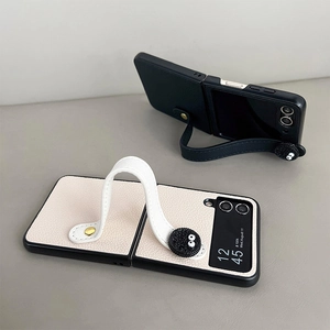 Custodia in pelle per Samsung Z Flip 5 con cinturino e decorazione a biscotto