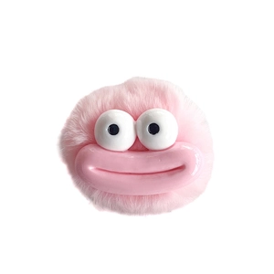 Pink plush cartoon phone grip with funny big mouth and wide eyes on white background