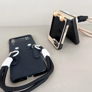 Leather folding phone case for Samsung Z Flip5 with heart pattern and wrist strap