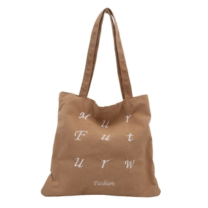 Brown corduroy tote bag with embroidered letters and long straps for casual daily use