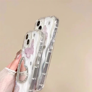 Detail of glitter butterfly phone case with heart rhinestone ring kickstand