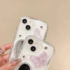 Detailed view of rhinestone butterfly phone case with mirror and glitter for iPhone