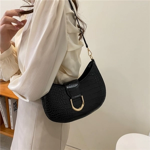 Elegant black crocodile-patterned crescent shoulder bag with golden U-shaped buckle