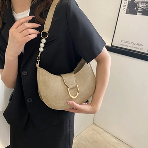 Beige crocodile pattern half-moon shoulder bag with elegant pearl strap decoration
