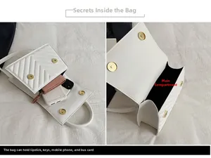 Detail of white quilted crossbody bag showing interior main pocket and magnetic closures