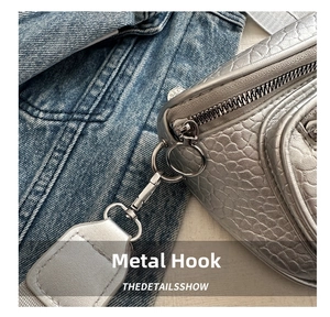 Detailed close-up of silver pebble leather bag with premium metal hardware and hook