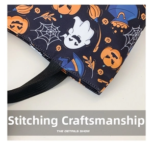 Detail of high-quality stitching and durable strap on the Halloween pumpkin tote bag