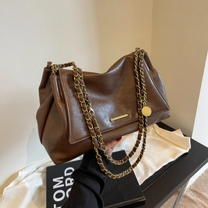 Retro brown PU leather tote bag with elegant gold chain strap and minimalist metal trim