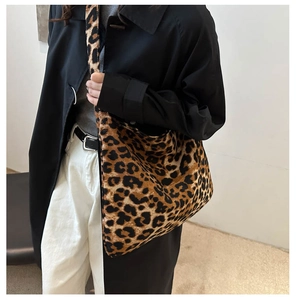 Detail shot of the textured leopard print tote bag with soft canvas shoulder strap