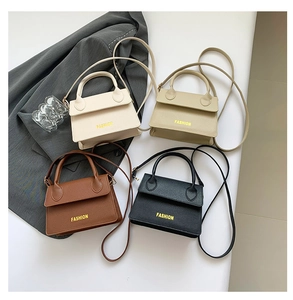 Four colors of litchi texture mini handbags featuring yellow fashion text print detail