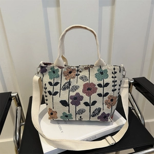 Floral print woven tote bag with adjustable shoulder strap and large capacity