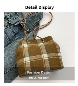 Detail view of the brown plaid tweed shoulder bag with gold chain and leather strap