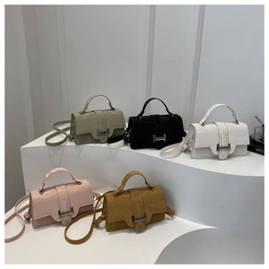 Five assorted vintage crossbody bags in olive, black, beige, pink, and yellow colors