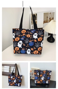 Detail view of canvas tote with colorful Halloween pumpkins, ghosts and witch hats print