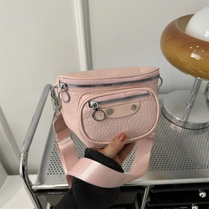 Pink lychee texture semi-circle crossbody bag with wide strap and silver hardware