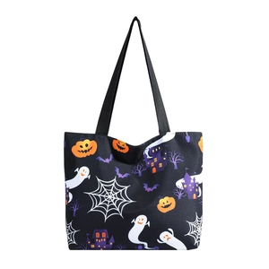 Halloween themed tote bag with festive pumpkin and ghost prints on a black canvas