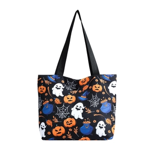 Halloween canvas tote bag with pumpkin, ghost, and witch hat print on black background