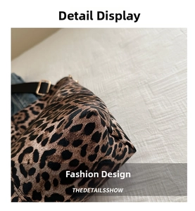 Detailed close-up of leopard print tote bag fabric texture and durable bottom corner stitching