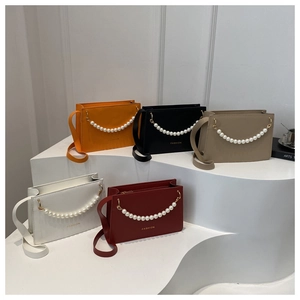 Multi-color leather shoulder bags with pearl chain handles and fashion typography detail