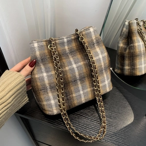 Plaid wool bucket bag with chain strap and fuzzy texture for autumn style