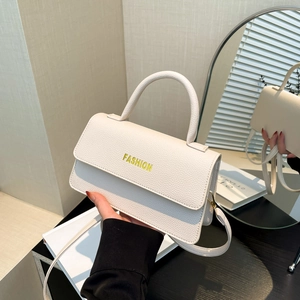 Minimalist beige pebble leather handbag with FASHION logo and adjustable shoulder strap