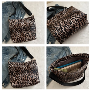 Detailed views of leopard print tote bag with wide strap and spacious interior capacity