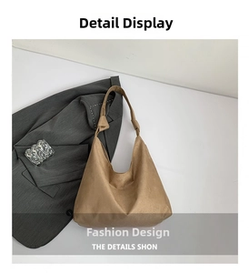 Vue détaillée du grand sac Hobo en daim marron avec détail de bandoulière nouée chic