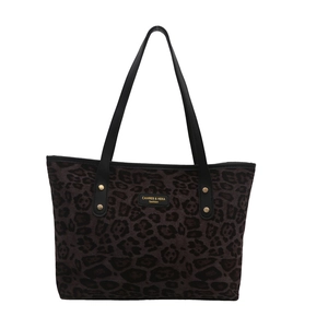 Trendy leopard print tote bag with black leather straps and gold rivet detailing